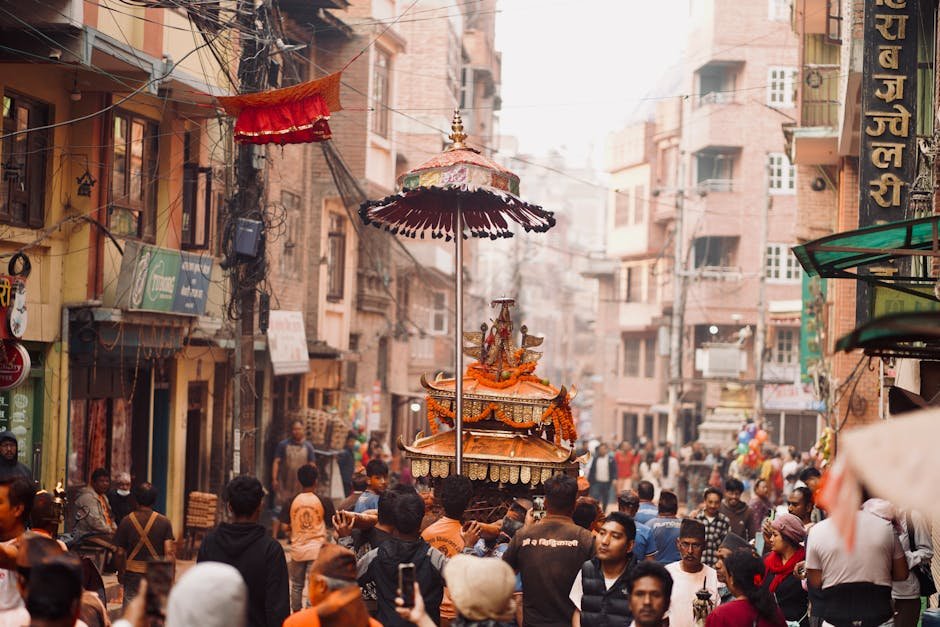 A lively street festival in Kathmandu, showcasing Nepalese culture and heritage with colorful processions and local participation.